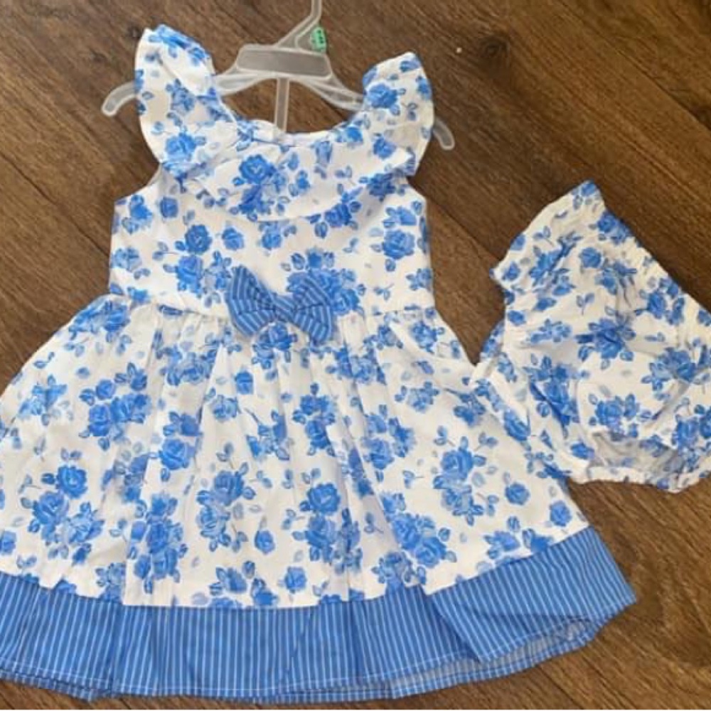 Nannette brand dress and comes with diaper cover to match. Beautiful. Brand new